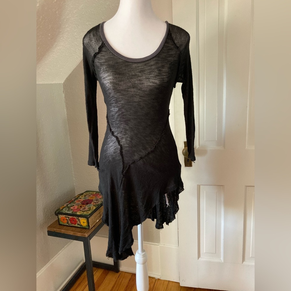 Size XS Free People black sheer distressed angled dress.